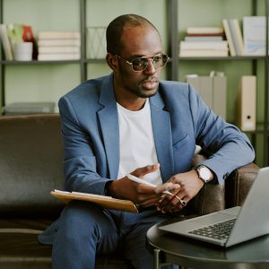 Conducting Business Meeting Online in Modern Office